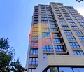 Снимка 2 — Двустаен апартамент с балкон в луксозна сграда в центъра на Бургас