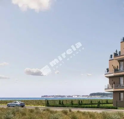 Снимка 5 — Двустаен апартамент с гледка море в Приморско, първа линия