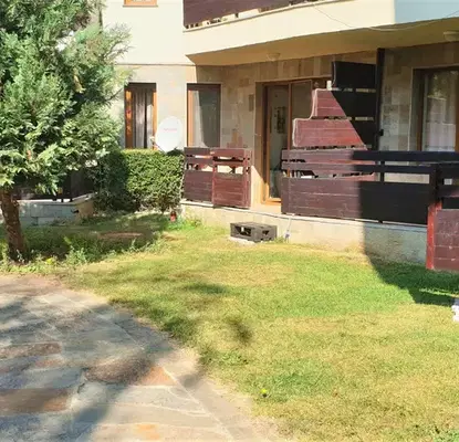 Снимка 4 — Двустаен апартамент с тераса в затворен комплекс в Банско