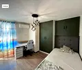 Снимка 5 — Многостаен апартамент в Благоев, Широк център