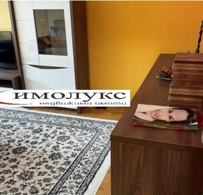 Снимка 2 — Двустаен апартамент с балкон и двустранно изложение в Дружба 1