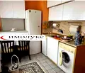 Снимка 5 — Двустаен апартамент с балкон и двустранно изложение в Дружба 1