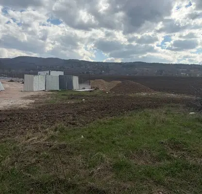 Photo 3 — Plot in German