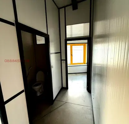 Photo 5 — Office in German