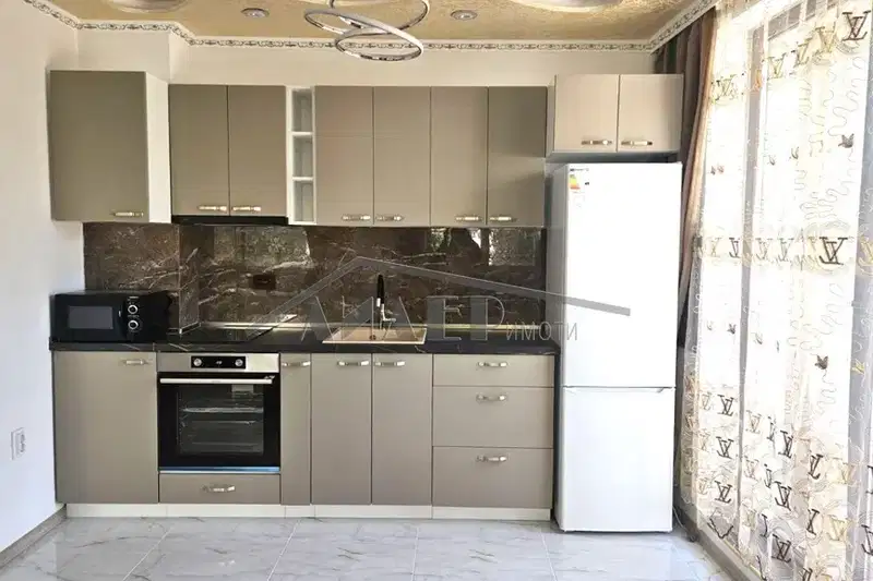 Three-room apartment in Karshiyaka with terrace and luxury furnishings