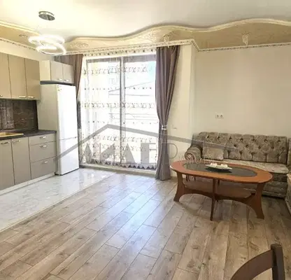 Photo 3 — Three-room apartment in Karshiyaka with terrace and luxury furnishings