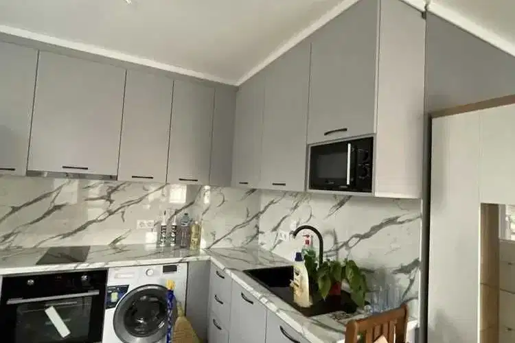 Two-room apartment in Zona B-18 with parking space and elevator
