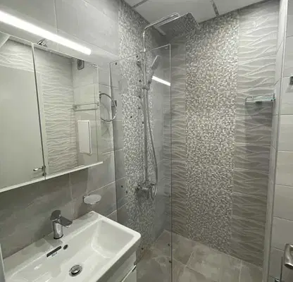 Photo 4 — Two-room apartment in Zona B-18 with parking space and elevator