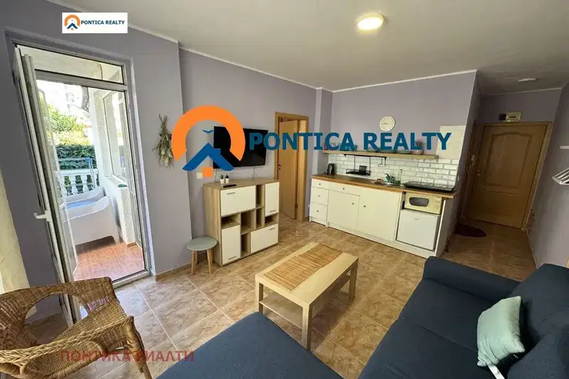 Two-room apartment in Sunny Beach with balcony and security