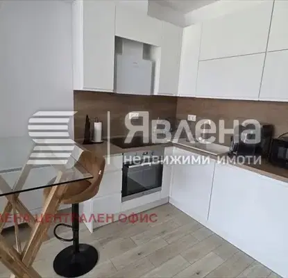 Снимка 2 — Двустаен апартамент в Лозенец с тераса и паркомясто