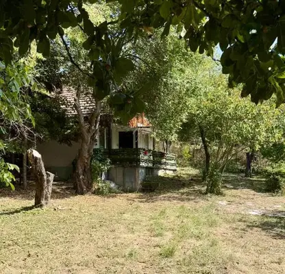 Photo 5 — Two-storey house in Sturgel village, Sofia region, with landscaped yard