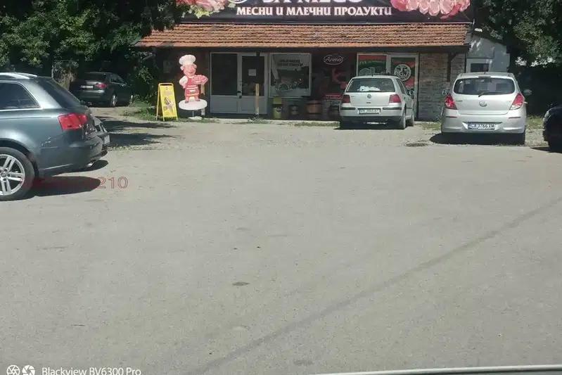 Магазин в Перник, Бели брег