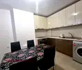 Снимка 2 — Многостаен апартамент в Благоев, Широк център