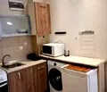 Снимка 4 — Двустаен апартамент в Мараша с тераса на 4-ти етаж