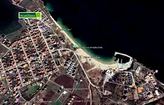 2-стаен апартамент с паркомясто на първа линия море в Крайморие