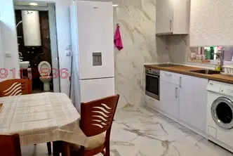 Тристаен апартамент на партер в Център, София с подово отопление